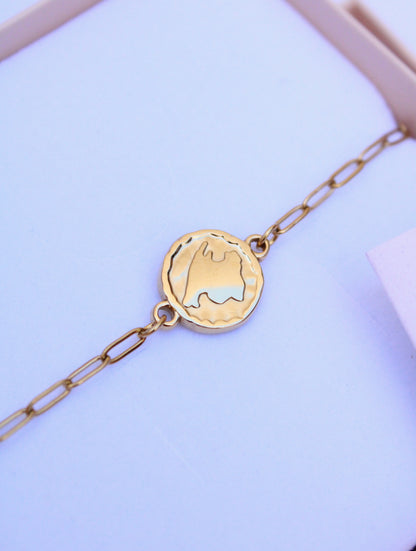 Pulsera moneda con la isla de Mallorca: souvenir mallorquín de acero