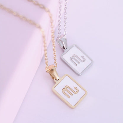 Collar del signo Escorpio de acero inoxidable con nácar de Hétika